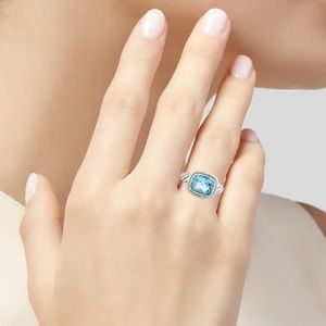 Vintage David Yurman 0.19 CTW Diamond & Blue Topaz Noblesse Ring. Size 8